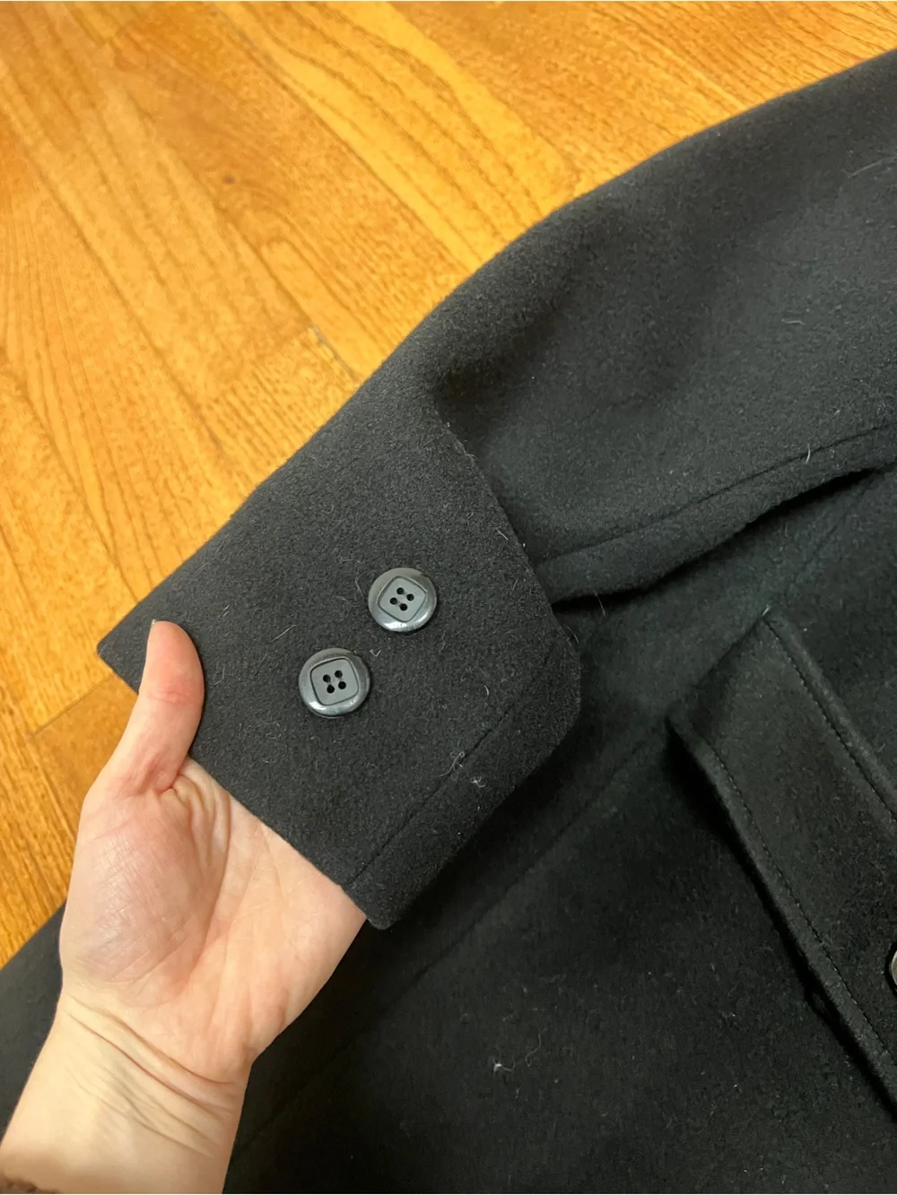 Classic Double-Breasted Black Wool Coat with velvet detail